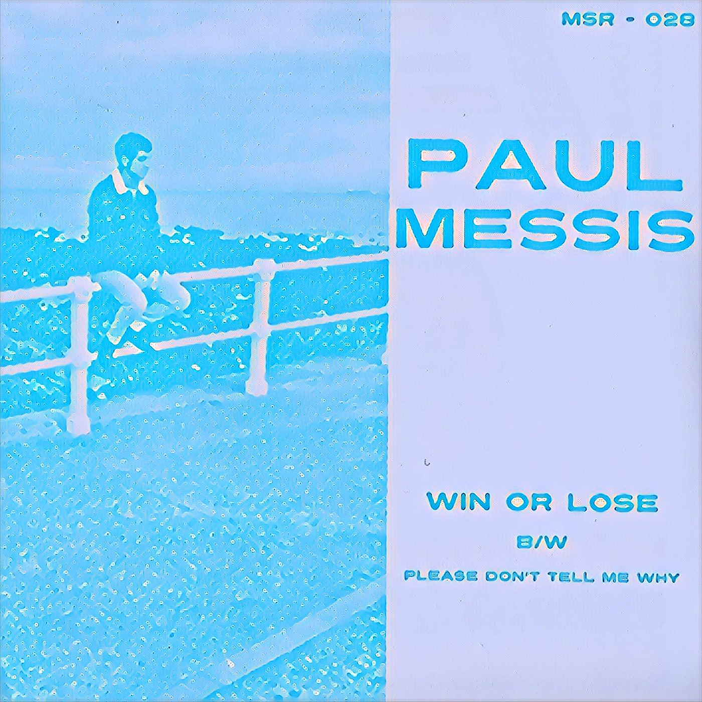 man sitting on a fence